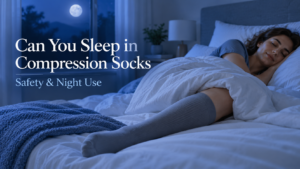 **SEO Title:** Can You Sleep in Compression Socks? Safety & Night Use **Meta Description:** Can you sleep in compression socks? Learn when to remove them, overnight risks, mmHg guidance, warning signs, and when nighttime compression may be prescribed. **URL Slug:** /can-you-sleep-in-compression-socks/ # Can You Sleep in Compression Socks? Safety, Risks and When Overnight Wear Makes Sense If compression socks make your legs feel lighter during the day, you may wonder whether keeping them on overnight adds more benefit. For most people using ordinary graduated compression socks, **usually not**: compression is most useful while you are upright, when gravity encourages blood and fluid to pool in the lower legs. A short nap in a properly fitted pair may be fine for many healthy adults, but routine overnight wear is different. Hospital anti-embolism stockings, postoperative plans, lymphedema garments and wound-care compression may follow different nighttime instructions. This guide explains when to remove compression socks, how mmHg affects the decision, who needs extra caution and which warning signs matter. ## Quick Answer: Should You Sleep in Compression Socks? For most healthy adults wearing over-the-counter graduated compression socks for standing, work, travel, mild swelling or exercise, the usual routine is to put them on in the morning and remove them before bed. Cleveland Clinic's 2026 guidance similarly advises daytime wear and removal before sleep, except for an occasional short nap. Compression works mainly by supporting venous return and limiting fluid buildup while you are upright. Overnight compression may still be appropriate when a healthcare professional has specifically prescribed it. Examples include certain anti-embolism stockings after surgery, some venous or wound-care regimens, and specialist treatment plans for lymphatic swelling. Those situations should not be treated like everyday sock use. A useful rule is simple: **do not assume that more hours or more pressure means more benefit.** The correct wearing schedule depends on why you are using compression, the type of garment, the pressure level, your circulation and your skin condition. ## Why Compression Socks Help More During the Day Graduated compression socks apply the most pressure near the ankle and progressively less pressure higher up the leg. This gradient supports venous return and helps limit blood and fluid pooling while you are standing or sitting. When you lie down, your legs are closer to heart level, so gravity is no longer acting on the veins in the same way. The main reason for routine daytime compression is therefore reduced. Removing the socks at night also gives you a chance to inspect the skin, notice pressure marks and moisturize before the next day's wear. ## Daytime vs Nighttime Compression: A Practical Decision Table | Situation | Typical nighttime approach | Why | | ------------------------------------------------- | ---------------------------------------------------------------------------------- | -------------------------------------------------------------------- | | Standing or sitting all day | Usually remove at bedtime | Compression is most useful while upright | | Mild evening ankle swelling | Usually remove at bedtime | Lying down and elevation may reduce pooling | | Short nap | Often acceptable if socks fit well and no medical contraindication exists | A brief nap is different from continuous overnight wear | | Long-term 24/7 use | Not routine without medical direction | Skin and pressure should be monitored | | After surgery with anti-embolism stockings | May be prescribed day and night | These are used under a postoperative prevention plan | | Lymphedema | Day garments are often removed at night; specialist nighttime garments may be used | Night management is individualized | | DVT or post-thrombotic symptoms | Follow the treating clinician's plan | Compression is not automatically required for every person after DVT | | PAD, major sensory loss, wounds or skin infection | Do not self-direct overnight compression | Circulation and skin risks need assessment | The key question is **why the garment is being used and what type it is**. ## Can You Wear Compression Socks Overnight for Swelling or Edema? If your ankles or lower legs become puffy after a day of standing, ordinary daytime compression may help limit fluid accumulation. But wearing the same socks all night is not automatically better. For many people, lying flat or elevating the legs reduces the gravity-related component of swelling. Persistent, severe, sudden or one-sided swelling can have many causes. New swelling with pain, redness or warmth should be medically assessed. Difficulty breathing or chest pain can be warning signs of pulmonary embolism and require urgent medical attention. If chronic venous swelling remains difficult to control despite correct daytime use, review the fit and treatment plan rather than automatically extending wear to 24 hours. ## What About 15–20, 20–30 or 30–40 mmHg While Sleeping? The pressure number on a compression sock is measured in **millimeters of mercury, or mmHg**. It describes the compression range, but it does not tell you whether a garment is appropriate for overnight wear. ### 15–20 mmHg This is a common moderate level for everyday support, travel or mild swelling. Many healthy people tolerate it well during the day. That does not create a general reason to sleep in it. Accidentally napping in a well-fitting pair when you have no circulation or sensation problems is different from deliberately wearing it every night. ### 20–30 mmHg This firmer level is often used for more significant venous symptoms or when a clinician recommends stronger graduated compression. Because fit and underlying circulation matter more as pressure increases, routine overnight use should not be assumed to be safe simply because daytime use is comfortable. ### 30–40 mmHg This is strong medical-grade compression used for specific medical indications. Cleveland Clinic advises medical supervision for extra-firm 30–40 mmHg products. Overnight use at this pressure should be based on a clinician-directed plan rather than a general sleep or recovery routine. The better question is not “Which mmHg is safe to sleep in?” but **“Was this exact garment and wearing schedule recommended for my situation?”** ## Risks and Side Effects of Sleeping in Compression Socks A correctly fitted compression sock should feel snug and supportive, not painfully tight. Problems are more likely when the sock is too small, too long, folded, rolled, wrinkled or worn continuously without skin checks. Potential problems include: * Skin irritation, dryness or itching * Pressure marks that do not quickly fade * Bunching behind the knee or around the ankle * A rolled cuff creating a tight band or tourniquet-like effect * Numbness, tingling or increasing pain * Cold toes or unusual color changes * Worsening swelling above or below the garment * Skin breakdown in people with fragile skin or reduced sensation An international consensus review on medical compression found that irritation, discomfort and pain are among the more commonly reported non-severe adverse effects. It also emphasizes careful assessment when arterial circulation is impaired. If a sock causes new pain, numbness, tingling, skin discoloration, skin damage or worsening swelling, remove it and contact a healthcare professional. Cleveland Clinic specifically identifies these symptoms as reasons to stop and seek advice. ## Who Should Be Especially Careful With Nighttime Compression? ### Peripheral Artery Disease and Arterial Insufficiency Compression affects the tissues surrounding blood vessels. If arterial blood flow to the legs is significantly impaired, inappropriate sustained compression can be harmful. Severe peripheral arterial occlusive disease is a recognized contraindication to sustained medical compression stockings in an international consensus statement. If you have diagnosed peripheral artery disease (PAD), weak foot pulses, a history of arterial procedures or known arterial circulation problems, do not choose nighttime compression on your own. ### Diabetes and Peripheral Neuropathy Diabetes does not automatically mean compression is forbidden. The concern is that some people with diabetes also have peripheral neuropathy, arterial disease, fragile skin or foot wounds. Reduced sensation matters because someone may not feel excessive pressure, rubbing or a folded sock while asleep. Cleveland Clinic advises professional guidance when severe loss of sensation or diabetes-related neuropathy is present. Diabetic socks and compression socks are also not automatically interchangeable. A non-binding diabetic sock may prioritize reduced friction and cuff pressure, while a compression sock deliberately applies graduated pressure. ### Open Wounds, Skin Infection or Fragile Skin Do not place an ordinary retail compression sock over an open wound, active skin infection or extremely fragile skin unless the treatment plan specifically includes medically supervised compression. Compression used in wound care is a clinical treatment. The dressing, compression system, pressure and monitoring may differ substantially from an everyday compression sock. ### Unexplained or Severe Swelling Compression is not a substitute for finding the cause of major or sudden swelling. Swelling caused by venous disease is different from swelling associated with heart, kidney, lymphatic, inflammatory or clotting problems. A new symptom deserves appropriate assessment rather than simply trying stronger compression. ## Sleeping in Compression Socks After Surgery This is one of the clearest exceptions to the usual “take them off at bedtime” advice. After some operations, patients are given **anti-embolism stockings** rather than ordinary graduated socks. These are intended for people with reduced mobility and may be ordered day and night until mobility improves. Cambridge University Hospitals, for example, advises selected postoperative patients to wear anti-embolism stockings day and night while removing them daily for washing and skin inspection. Postoperative instructions vary by surgery, mobility and clot risk. Some venous procedures use continuous compression briefly before switching to daytime-only wear. If your discharge paperwork says to wear stockings overnight, follow that plan. Do not substitute a stronger commercial pair unless your surgical team tells you to. ## Can You Sleep in Compression Socks After a DVT or Blood Clot? Do not create your own overnight compression routine after a deep vein thrombosis. Modern guidelines do not recommend compression stockings routinely for every person with DVT simply to prevent post-thrombotic syndrome. The American Society of Hematology states that compression stockings are not routinely recommended for preventing post-thrombotic syndrome after DVT, although they may help selected people with edema or pain. This means “I had a blood clot” does not automatically translate into “I should wear compression 24/7.” Treatment may involve anticoagulation, mobility guidance and symptom-directed compression. If stockings are part of your plan, ask exactly which pressure, garment length and daily schedule should be used. ## Lymphedema and Overnight Compression Lymphedema management deserves its own category. Standard daytime compression garments are often removed at night. Macmillan Cancer Support advises that compression garments are generally worn throughout the day and can usually be removed while sleeping or lying down. However, some people with lymphedema use specialist nighttime garments or bandaging as part of an individualized management program. These products are not necessarily the same as daytime graduated compression stockings. If overnight compression is needed, a lymphedema specialist can help determine the appropriate garment and pressure strategy. ## Pregnancy, Varicose Veins, Athletes and Restless Legs During pregnancy, compression stockings may be used for daytime swelling or travel-related clot-risk reduction. The CDC includes graduated compression stockings among measures that may help some pregnant travelers. That does not make routine bedtime wear necessary. Sudden, one-sided or substantial swelling should be discussed with an obstetric healthcare professional rather than managed simply by adding more compression hours. For varicose veins or chronic venous insufficiency, daytime compression may reduce heaviness or swelling, but routine overnight wear is usually unnecessary unless a clinician says otherwise. Athletes should likewise not assume that a “recovery” sock needs to stay on all night. Compression stockings are also not a standard treatment specifically for restless legs syndrome. ## Can You Wear Compression Socks 24 Hours a Day? For ordinary graduated compression socks, continuous 24/7 wear is not the usual routine. Most users are advised to wear them while awake and remove them at bedtime. MedlinePlus also emphasizes following the prescribed daily schedule and wearing correctly fitted stockings without wrinkles or bunching. Exceptions occur in hospitals and some postoperative settings. If removing your socks for a few hours causes major swelling or discomfort, ask for a treatment review rather than assuming continuous wear is the solution. ## How Compression Socks Should Fit Before You Consider Extended Wear Fit is separate from compression level. Even a 15–20 mmHg sock can cause problems if it is the wrong size. For knee-high socks, measure the narrowest ankle circumference and widest calf circumference, then check leg length if the brand requires it. Shoe size alone is often not enough. Put the socks on when swelling is minimal, smooth out wrinkles and never fold the top band down. If the sock rolls, pinches, bunches behind the knee or leaves a deep band, recheck the size and length. Wide-calf users should choose a range designed for their calf measurement rather than simply buying a longer foot size. Petite users may need shorter stockings to avoid bunching. MedlinePlus specifically advises smoothing out wrinkles and avoiding bunching when putting on compression stockings. ## Is Leg Elevation Better Than Compression Socks at Night? For simple gravity-related swelling, lying down and elevating the legs can reduce the downward pressure that contributes to pooling. That may be enough for some people after a long day. But leg elevation and compression are not interchangeable treatments for every medical cause of swelling. A person with lymphedema, a venous ulcer, postoperative clot risk or another diagnosed condition may need a more specific treatment plan. If you use elevation for comfort, support your lower legs comfortably rather than creating a sharp pressure point behind the knees. Seek medical advice if swelling is persistent, unexplained or progressively worsening. ## A Safer Day-to-Night Routine for Most Everyday Users For someone using compression socks for work, travel or mild venous swelling, a practical routine is: 1. Put the socks on in the morning before significant swelling develops. 2. Wear them during periods when you are sitting or standing for a long time. 3. Keep the fabric smooth and make sure the cuff does not roll. 4. Remove them if you develop pain, numbness, tingling, unusual coldness, discoloration or worsening swelling. 5. Take them off before bed unless you have specifically been told to wear them overnight. 6. Inspect and moisturize your skin after removal. 7. Use a clean, correctly fitted pair the next day as needed. This approach focuses on the hours when ordinary graduated compression is most useful without turning “more wear” into an automatic goal. ## Frequently Asked Questions ### Is It Safe to Sleep With Compression Socks On? For many healthy adults, accidentally sleeping in a correctly fitted pair is unlikely to cause a problem. Routine overnight use, however, is generally unnecessary. Remove them before bed unless a healthcare professional has given you a specific reason to wear them while sleeping. ### Can You Nap in Compression Socks? A short nap is different from wearing compression all night. Cleveland Clinic notes that an occasional catnap in compression socks can be acceptable. If you have PAD, reduced sensation, wounds or another medical condition affecting the legs, follow individualized guidance instead. ### Should Compression Socks Be Removed at Bedtime? For ordinary graduated compression socks, yes, that is the usual routine. Hospital anti-embolism stockings, postoperative garments and other prescribed compression systems may have different instructions. ### How Many Hours Should You Wear Compression Socks? There is no universal number that applies to everyone. Many people wear compression socks for much of their waking day. Appropriate duration depends on why you are using them, the compression level, fit, skin tolerance and any medical instructions you have received. ### Is 12 Hours Too Long to Wear Compression Socks? Not necessarily. Many people can wear a correctly fitted pair throughout a long workday. Comfort, skin condition, fit and the reason for compression matter more than an arbitrary 12-hour cutoff. ### Can Compression Socks Cut Off Circulation While Sleeping? A correctly fitted stocking should not cut off circulation in a healthy leg, but excessive pressure, rolling, bunching or underlying arterial disease can cause problems. New numbness, pain, coldness or color changes should not be ignored. ### Why Do My Toes Go Numb or Feel Cold in Compression Socks? Numbness or cold toes can indicate that the garment is too tight, incorrectly fitted, bunched or unsuitable for your circulation. Remove the garment. If the symptoms persist, recur frequently or occur with pain or color changes, seek medical advice. ### Should Compression Socks Leave Marks Overnight? A mild temporary impression can occur with a snug garment. Deep grooves, persistent redness, blistering, pain or discoloration deserve attention. They may indicate poor fit, excessive localized pressure or another skin or circulation issue. ### Can Diabetics Sleep in Compression Socks? There is no one answer for every person with diabetes. People with diabetes may use compression in certain circumstances, but diabetes-related neuropathy, peripheral artery disease, wounds and reduced sensation can change the risk. Overnight compression is particularly worth discussing with a healthcare professional if any of these issues are present. ### Can You Sleep in 20–30 mmHg Compression Socks? Routine sleeping in 20–30 mmHg compression socks should not be assumed to be beneficial simply because the socks are comfortable during the day. This level is commonly used for more significant venous symptoms, so overnight use should depend on the reason for treatment, fit, circulation and professional instructions. ### Do Compression Socks Reduce Swelling Overnight? Not necessarily. For ordinary gravity-related swelling, lying flat already reduces the effect of gravity on the lower legs. Standard compression socks may therefore add little benefit during sleep for many people. Medical conditions such as lymphedema or significant venous disease may require a different plan. ### When Is Overnight Compression Medically Necessary? Examples can include selected postoperative anti-embolism protocols, certain venous or wound-care plans, and specialist nighttime lymphedema management. The important difference is that overnight compression is part of a defined clinical plan rather than a general wellness habit. ## Bottom Line Can you sleep in compression socks? **Usually, you do not need to.** For ordinary graduated compression used for work, travel, mild swelling, varicose-vein symptoms or everyday support, daytime wear followed by bedtime removal is the common approach. Overnight compression is not automatically unsafe, but it should not be treated as a “more is better” strategy. Stronger pressure, longer wear and sleeping in compression do not guarantee better circulation or faster recovery. The exceptions — including some postoperative, lymphedema and wound-care situations — are best managed with a garment and wearing schedule chosen for the actual medical need. If you have PAD, major sensory loss, diabetes-related neuropathy, open wounds, skin infection, severe unexplained swelling or a recent DVT, get individualized guidance before deciding to wear compression socks overnight. **Medical Information Notice:** This article provides general educational information and is not a substitute for individualized medical advice. If you have a diagnosed vascular condition, significant or unexplained swelling, loss of sensation, wounds, skin infection or another medical concern, ask a qualified healthcare professional what type of compression, if any, is appropriate for you. ## Sources & Medical References **Cleveland Clinic — What You Need To Know About Compression Socks (July 2026).** Guidance on compression levels, daytime wear, bedtime removal, fit, PAD, neuropathy and warning signs. **Cleveland Clinic — Can You Sleep in Compression Socks?** Discussion of daytime versus nighttime compression and occasional naps. **MedlinePlus — Compression Stockings.** Patient guidance on fit, wearing schedules, morning application and preventing wrinkles or bunching. **Rabe et al. — Risks and Contraindications of Medical Compression Treatment: International Consensus Statement.** Evidence review covering arterial disease, neuropathy, skin risks and contraindications to sustained compression. **American Society of Hematology — Guidelines for Treatment of DVT and Pulmonary Embolism.** Guidance regarding routine compression stockings after DVT and symptom-directed use. **CDC — Venous Thromboembolism and Blood-Clot Symptoms.** Information on DVT and pulmonary embolism warning signs. **Cambridge University Hospitals — Anti-Embolic Stockings.** Postoperative guidance on selected day-and-night anti-embolism stocking use and skin checks. **Macmillan Cancer Support — Compression Treatment for Lymphoedema.** Guidance on daytime compression garments, nighttime removal and specialist care.